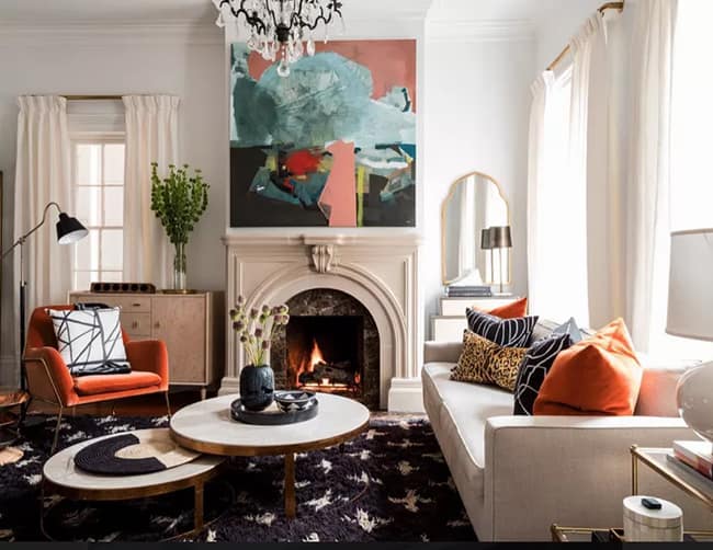 cozy-maximalism-living-room-with-bold-orange-statement-furniture-pieces-chair